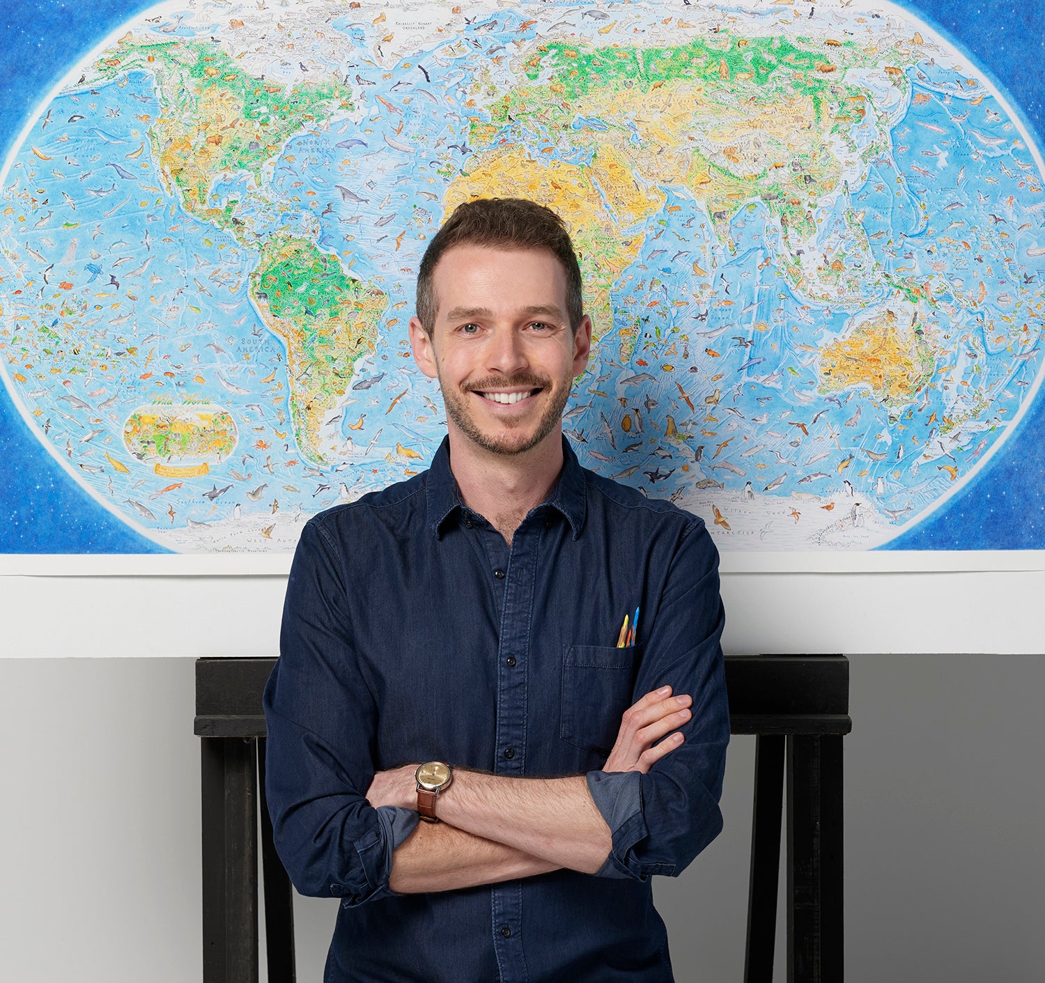 Map Artist Anton Thomas and his Wild World Map, a world map of nature with more than 1,600 animals